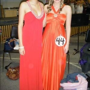 Orange pleated empire waist gown